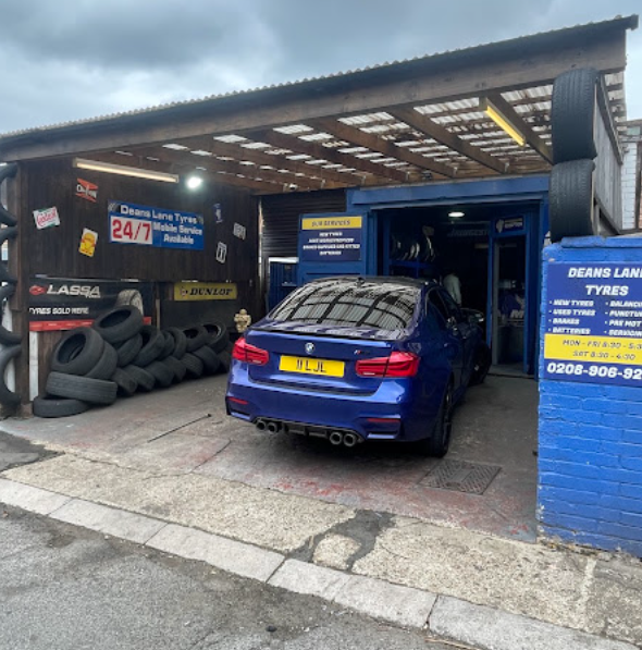BMW in for tyres outside Deans Lane Tyres, Edgware
